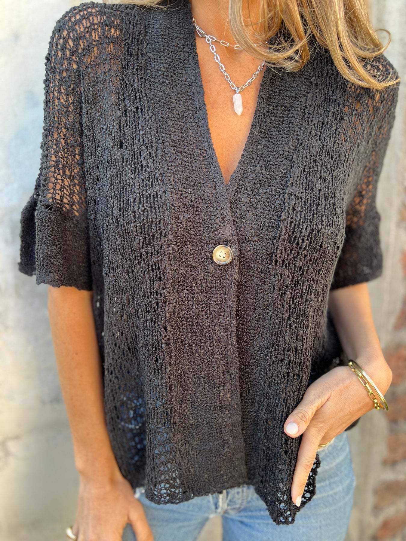 Elegante cardigan con scollo all'americana,