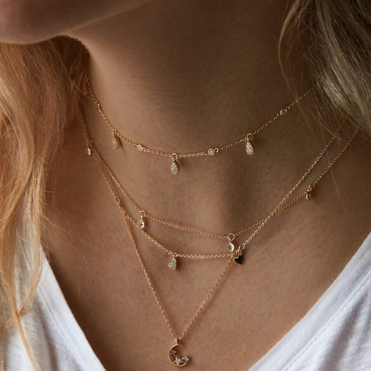 Collana con stella e luna placcata in oro. - Ciondolandia